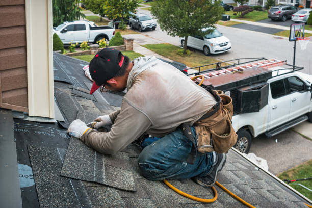 Professional Flat Roof Repair technician working in Huntsburg, OH
